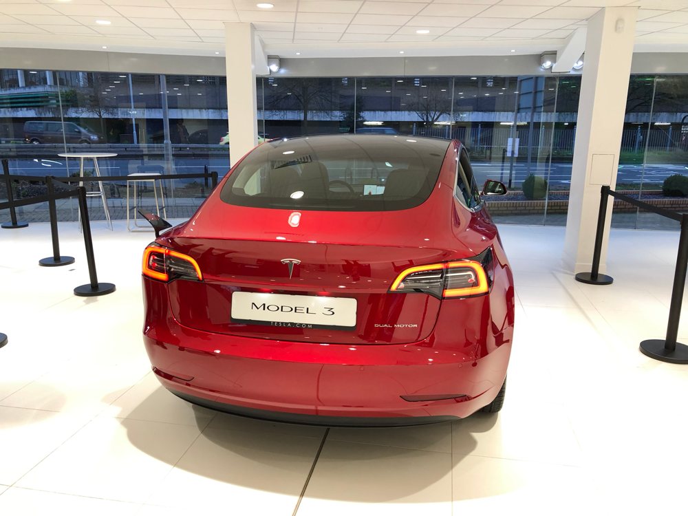 tesla model 3 rear in london showroom